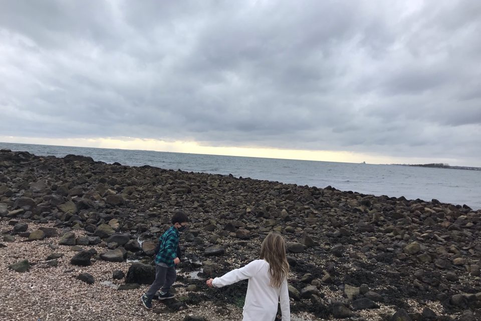 Bluff Point in Groton, Connecticut with kids hiking by the coast