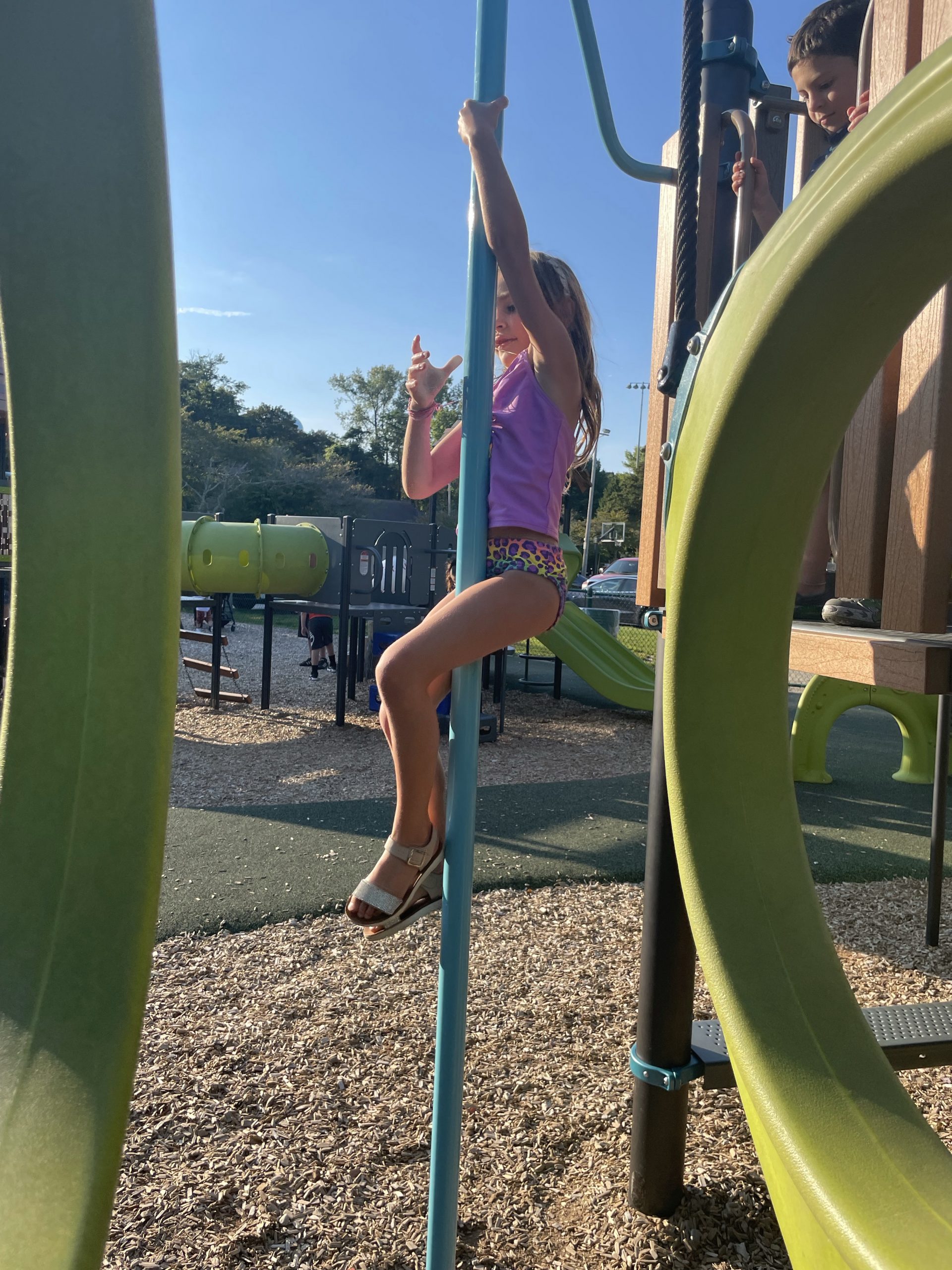 Wilson Park playground with kids in North Kingstown, Rhode Island